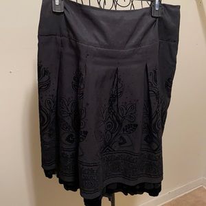 Black embroidered ruffled skirt